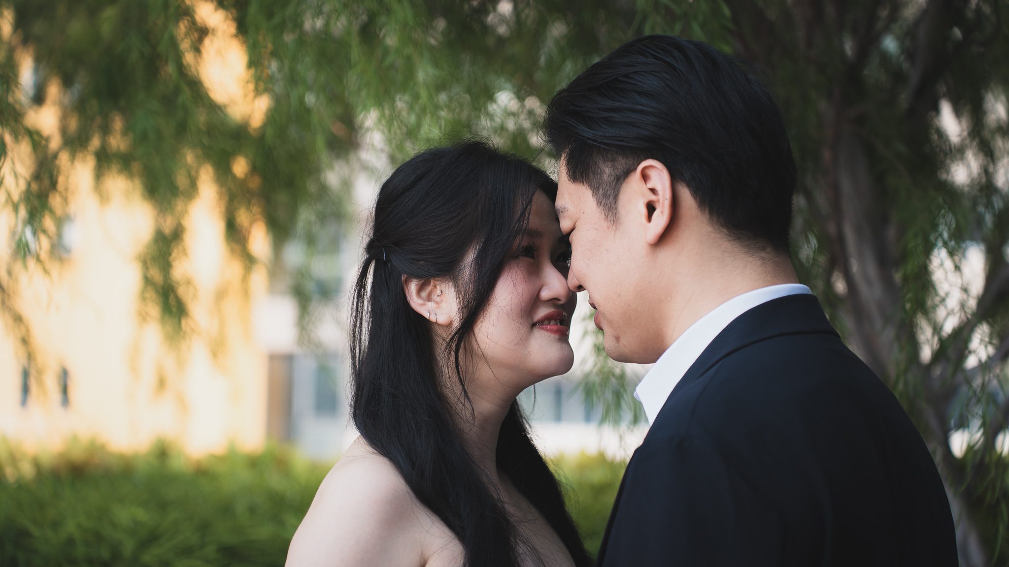 A bride and groom close together, photographed by KYO Collective