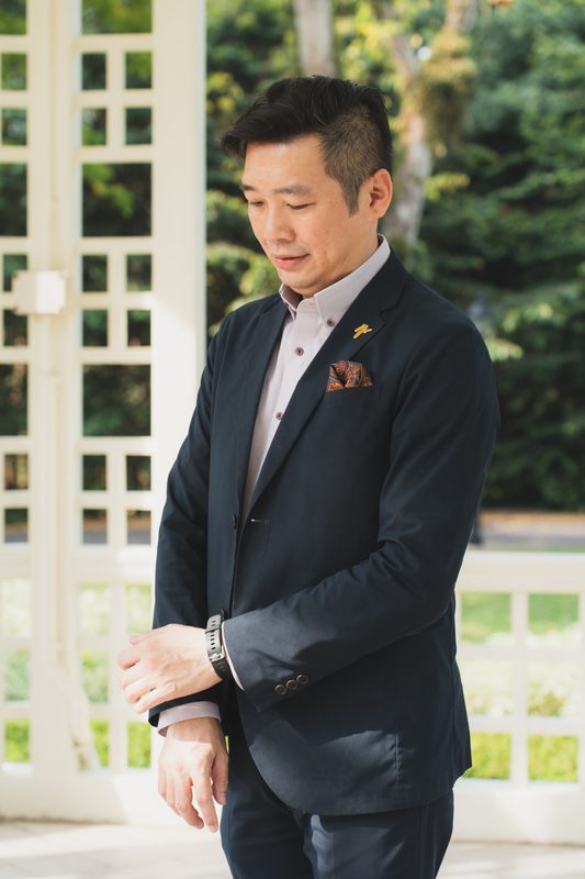 The officiator, moments before the ceremony
