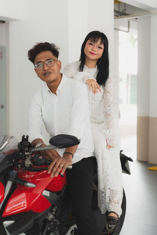 The couple with a motorcycle